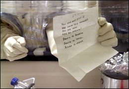 Letter being extracted from envelope