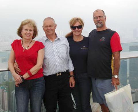 Photo of Jean and Scott Adam with the Crew of the Quest